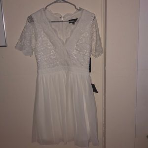 ANGEL IN DISGUISE WHITE LACE SKATER DRESS
LULUS